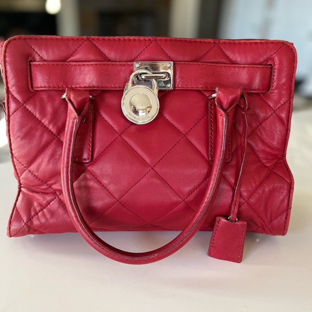 Michael Kors quilted red purse in excellent condition.